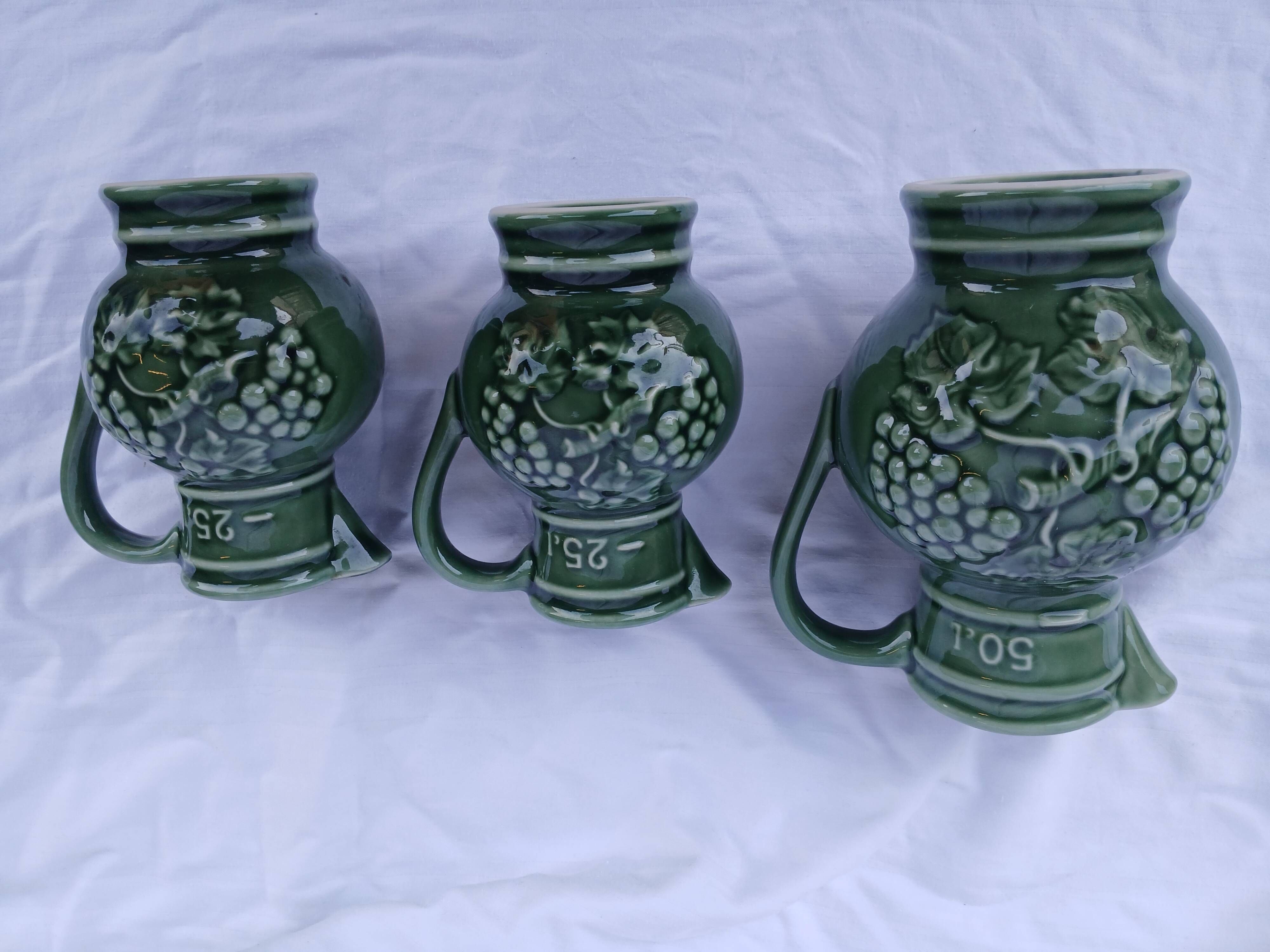 3 antique wine jugs
