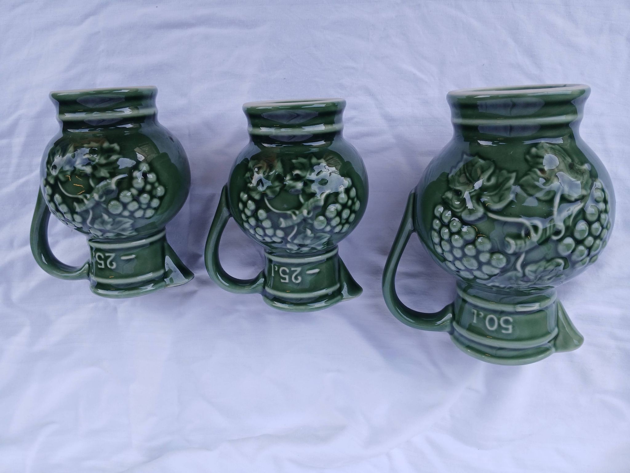 3 antique wine jugs