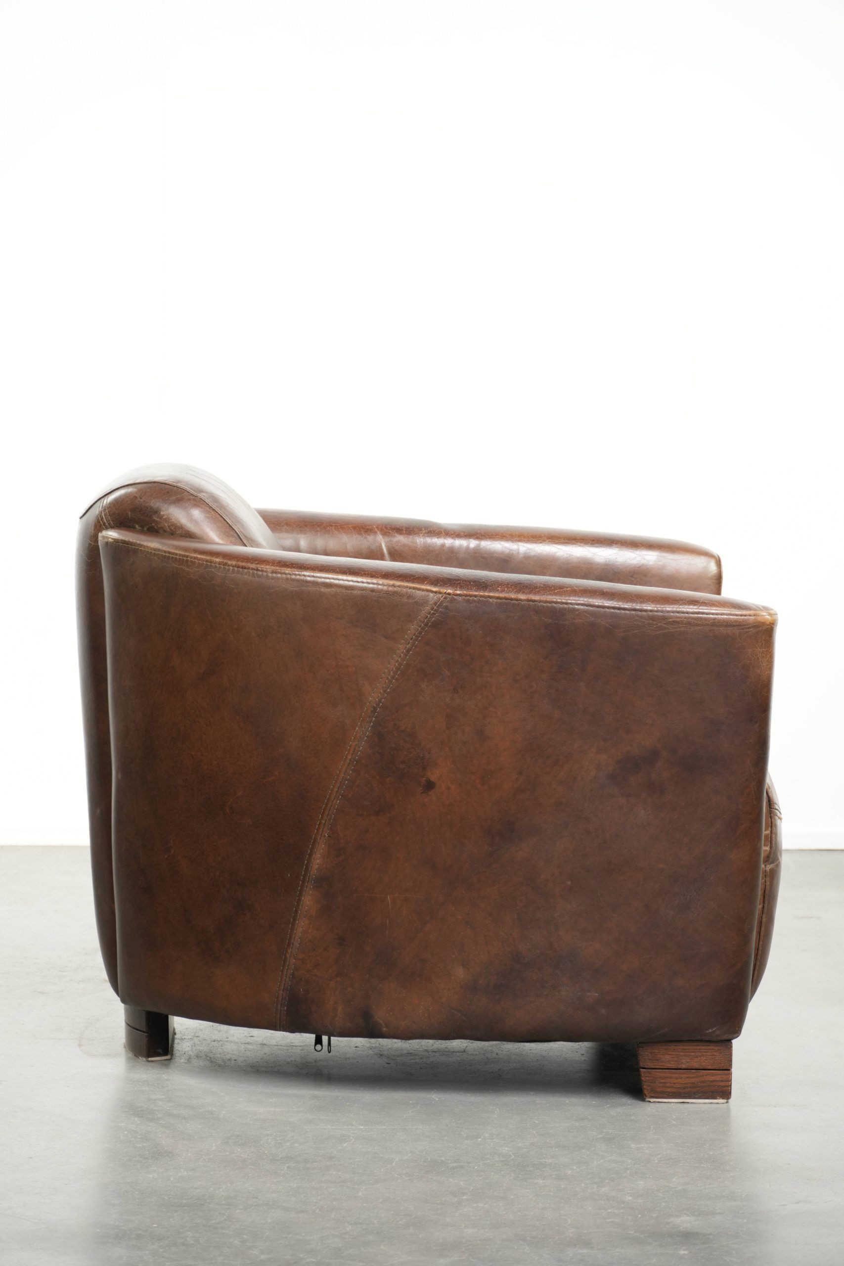 Sturdy dark cognac brown cow leather Aviator design armchair