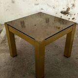 Trio of nesting tables, brass structures and smoked mirror tops
