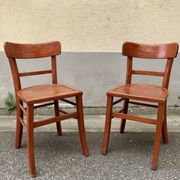 Pair of wooden bistro chairs with orange patina, 1950s