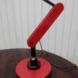 Red desk Guzzini lamp of the 1970s Italy