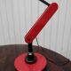 Red desk Guzzini lamp of the 1970s Italy