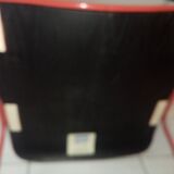 Stackable chair brand Howe, model 40/4, red lacquer base