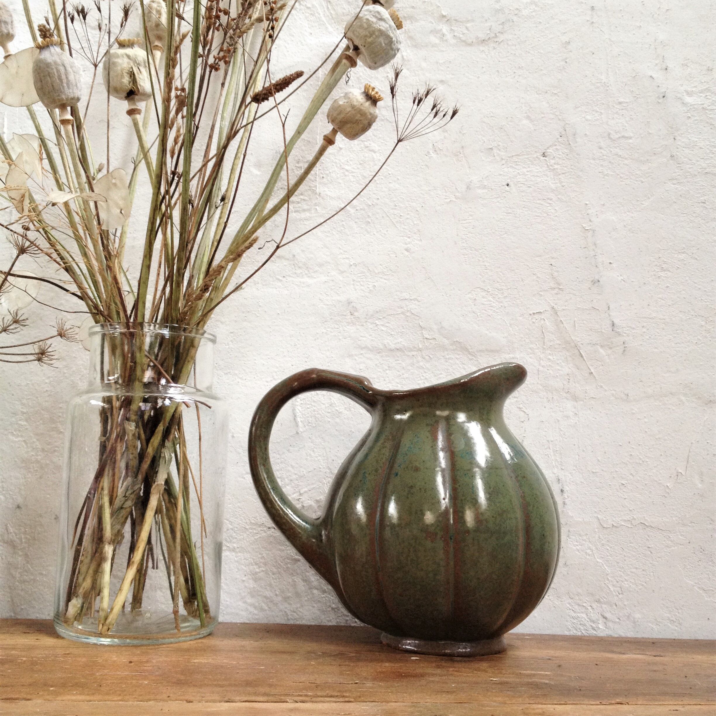 Green enamelled sandstone pitcher