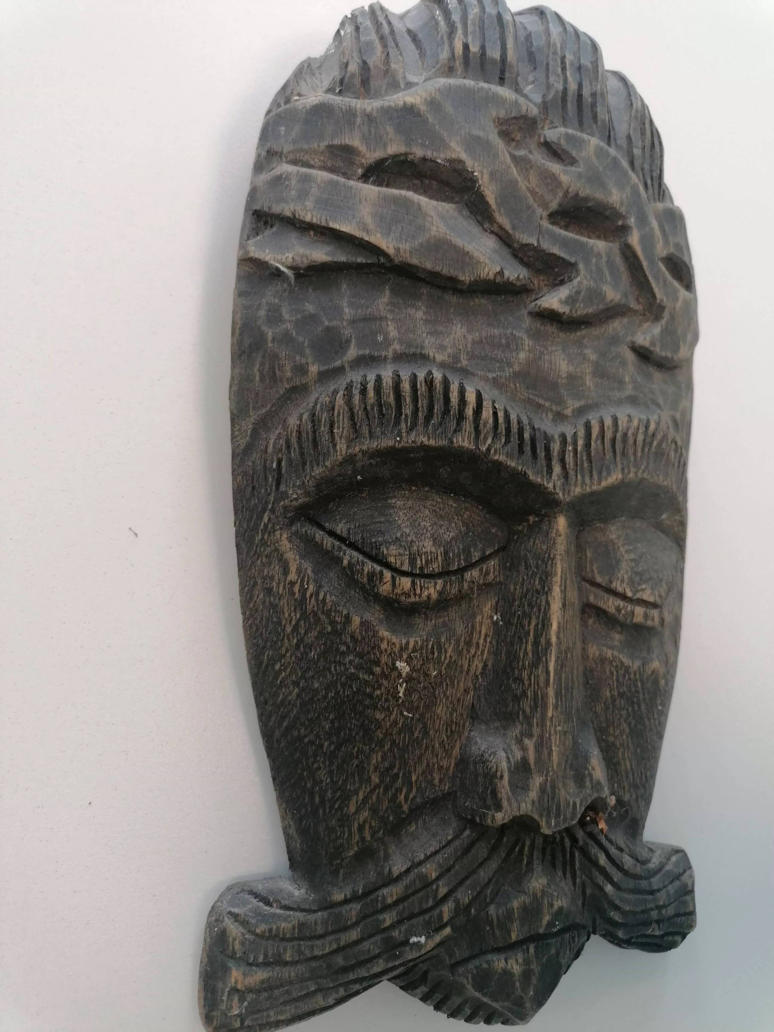 African tribal mask in carved wood - decorative ethnic art