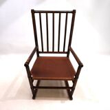 Manou rattan armchair with leather seat, 1960