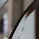 Vintage smoked bevelled mirror, in the style of Antonio Lupi, 70s.