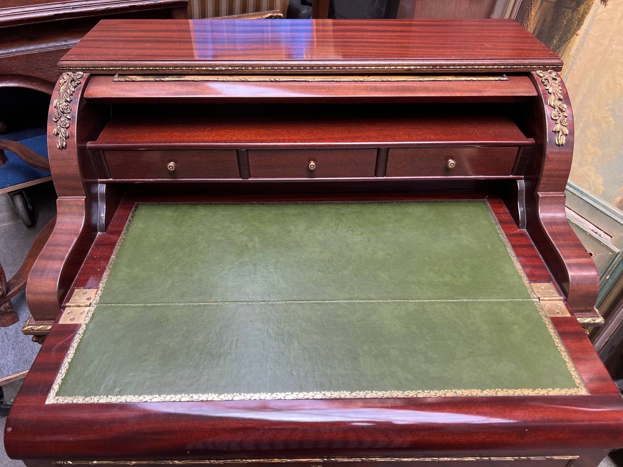 Louis XV style cylinder desk with gilded bronze mounts.