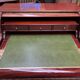 Louis XV style cylinder desk with gilded bronze mounts.