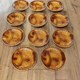 Vintage barbotine plates with fish decoration, 22 pieces.