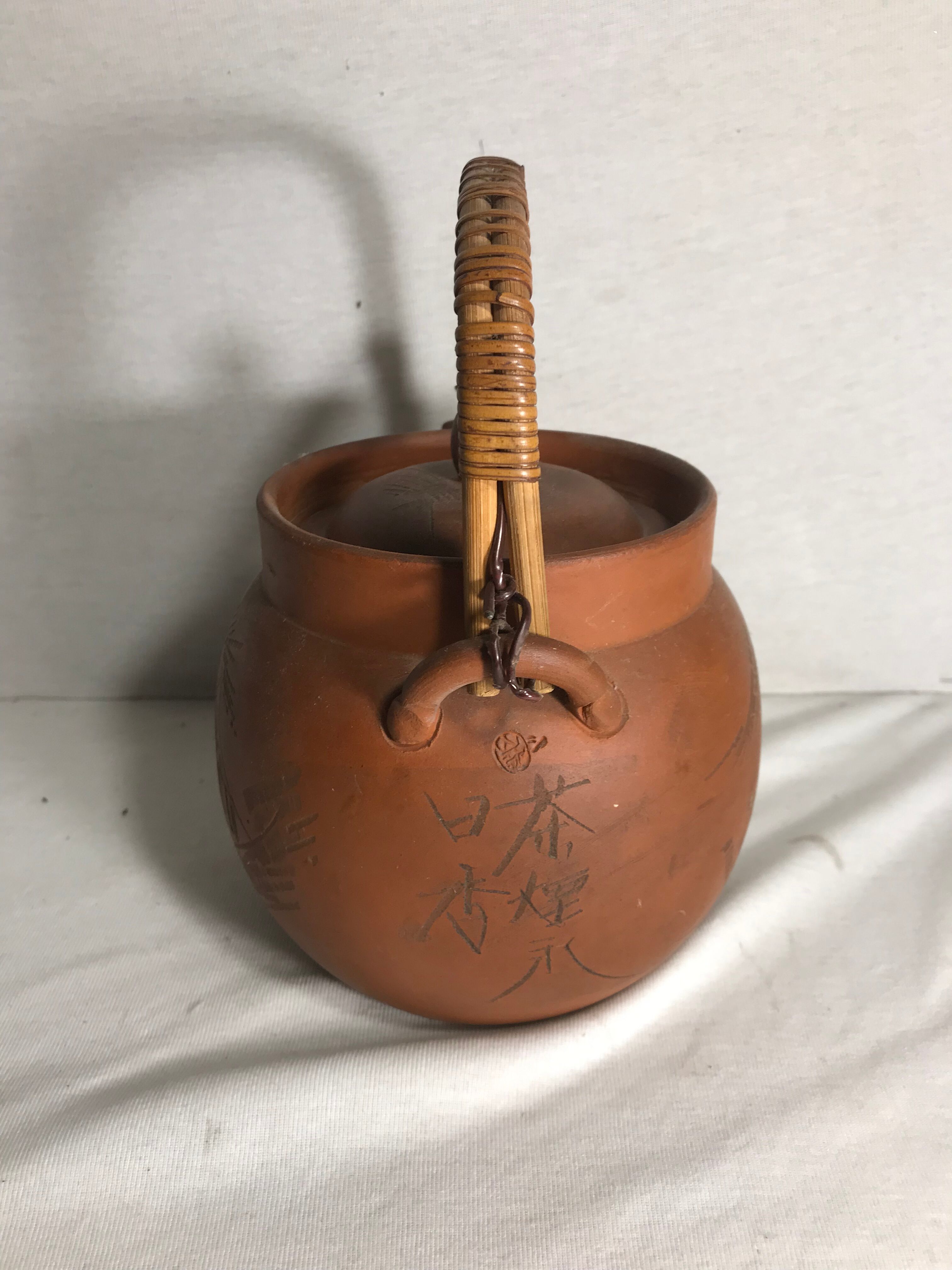 Antique terracotta teapot
