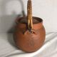 Antique terracotta teapot