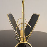 Magazine rack in brass and black lacquered metal, Italy 1970s