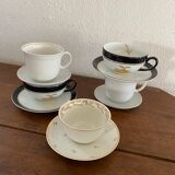 5 tasses à café en blanc , doré et noir