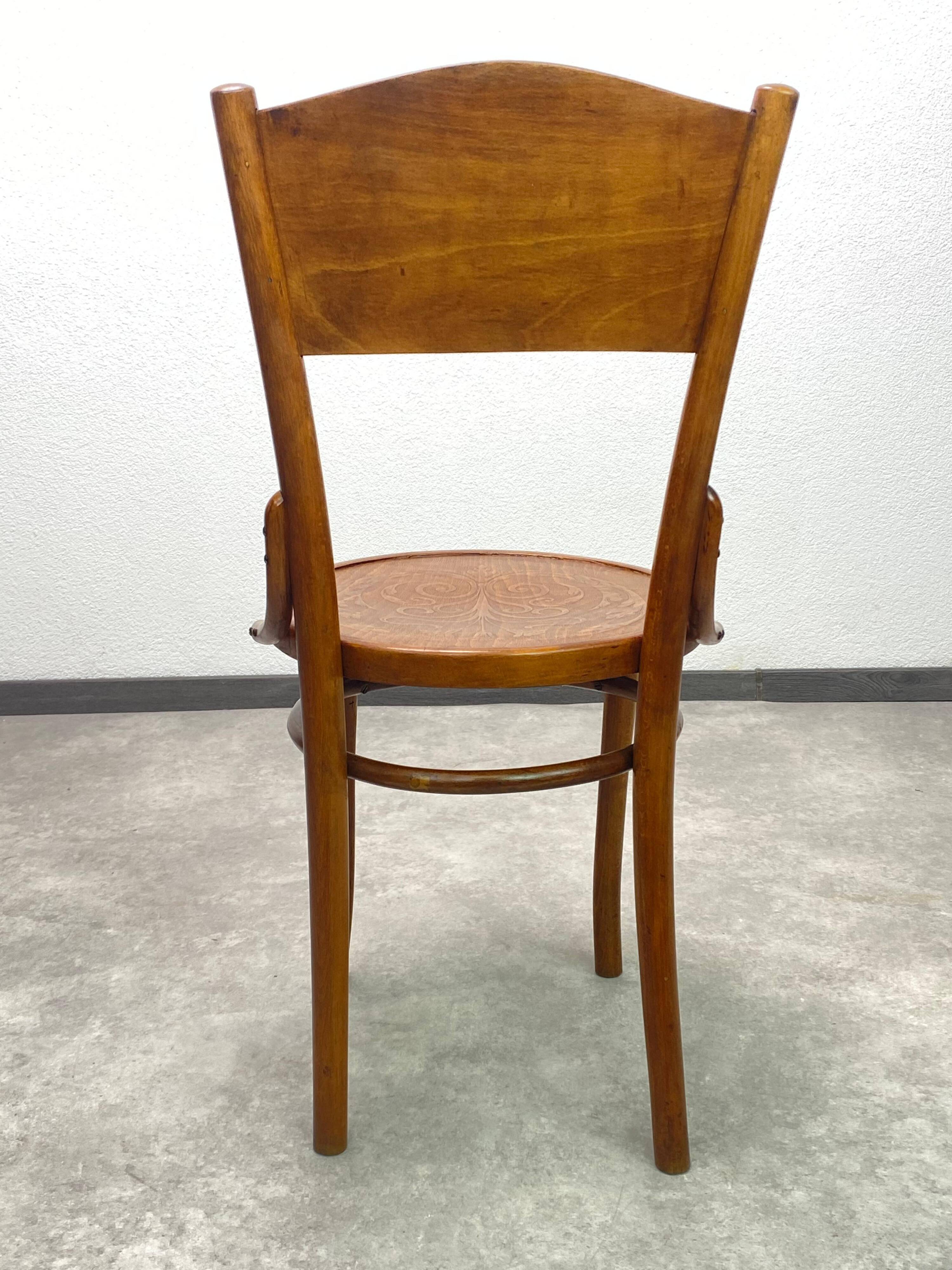 Set of 4 dining chairs by Thonet Mundus