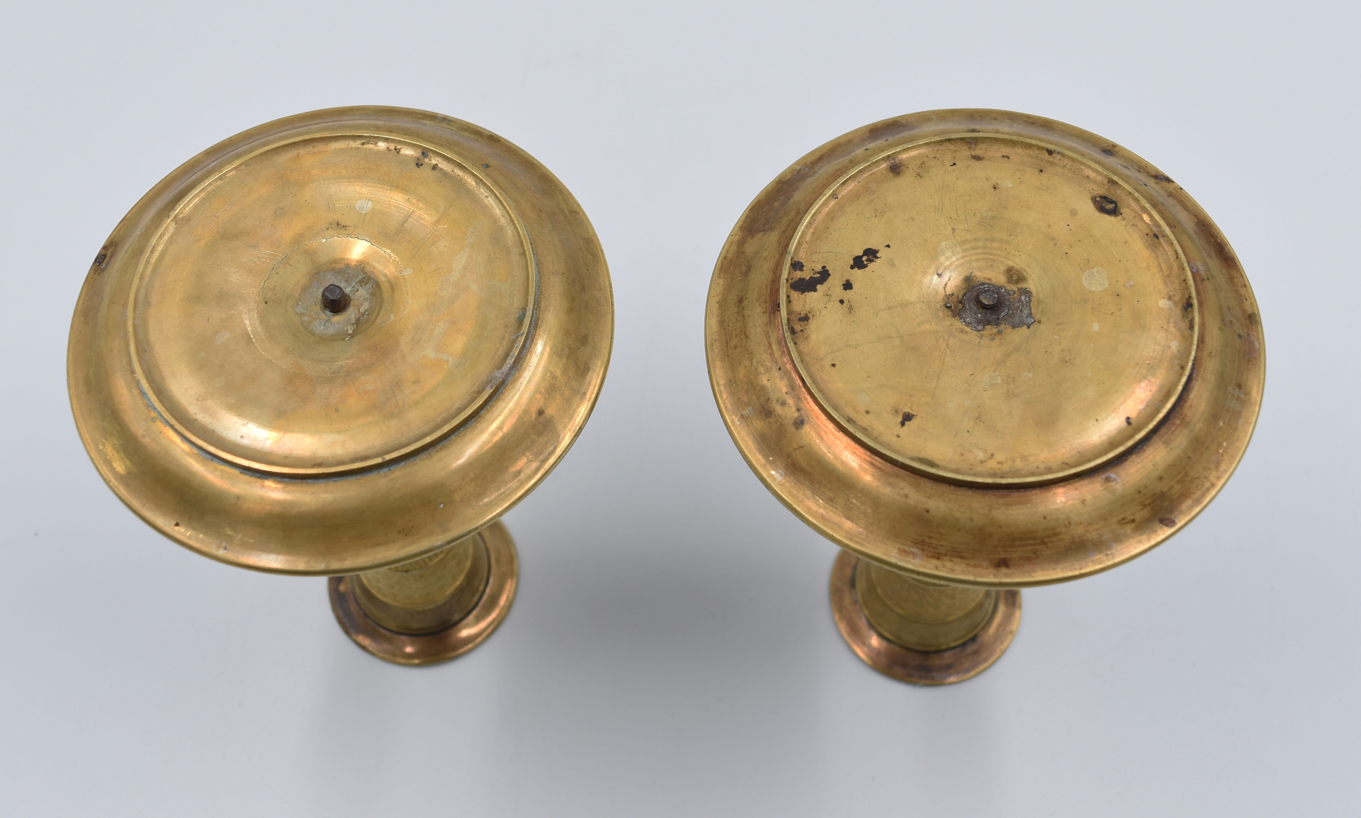 Pair of gossip candle holders in bronze and brass gilded period
