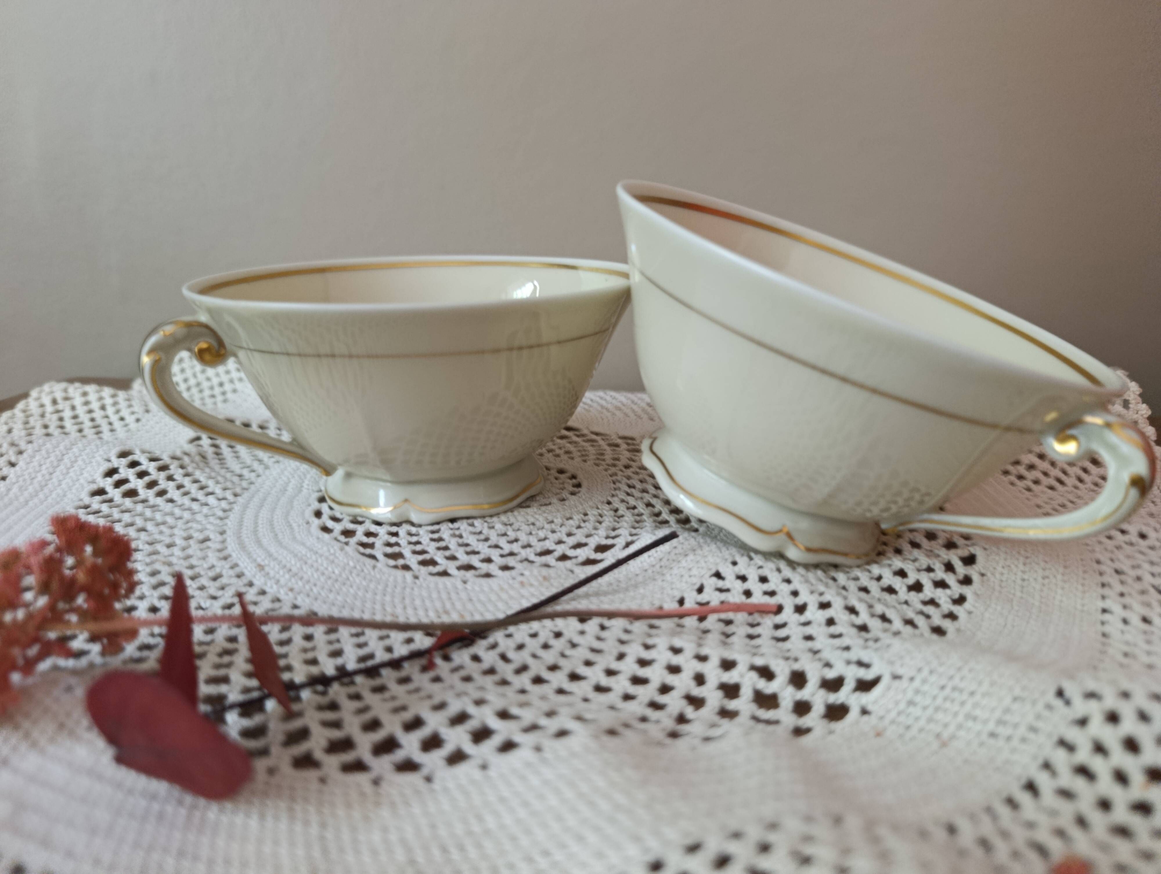 Two retro country-style porcelain tea cups, Former Royal Manufacture