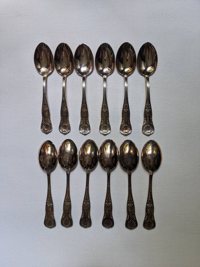 Set of 12 large silver metal spoons, stainless steel, shell