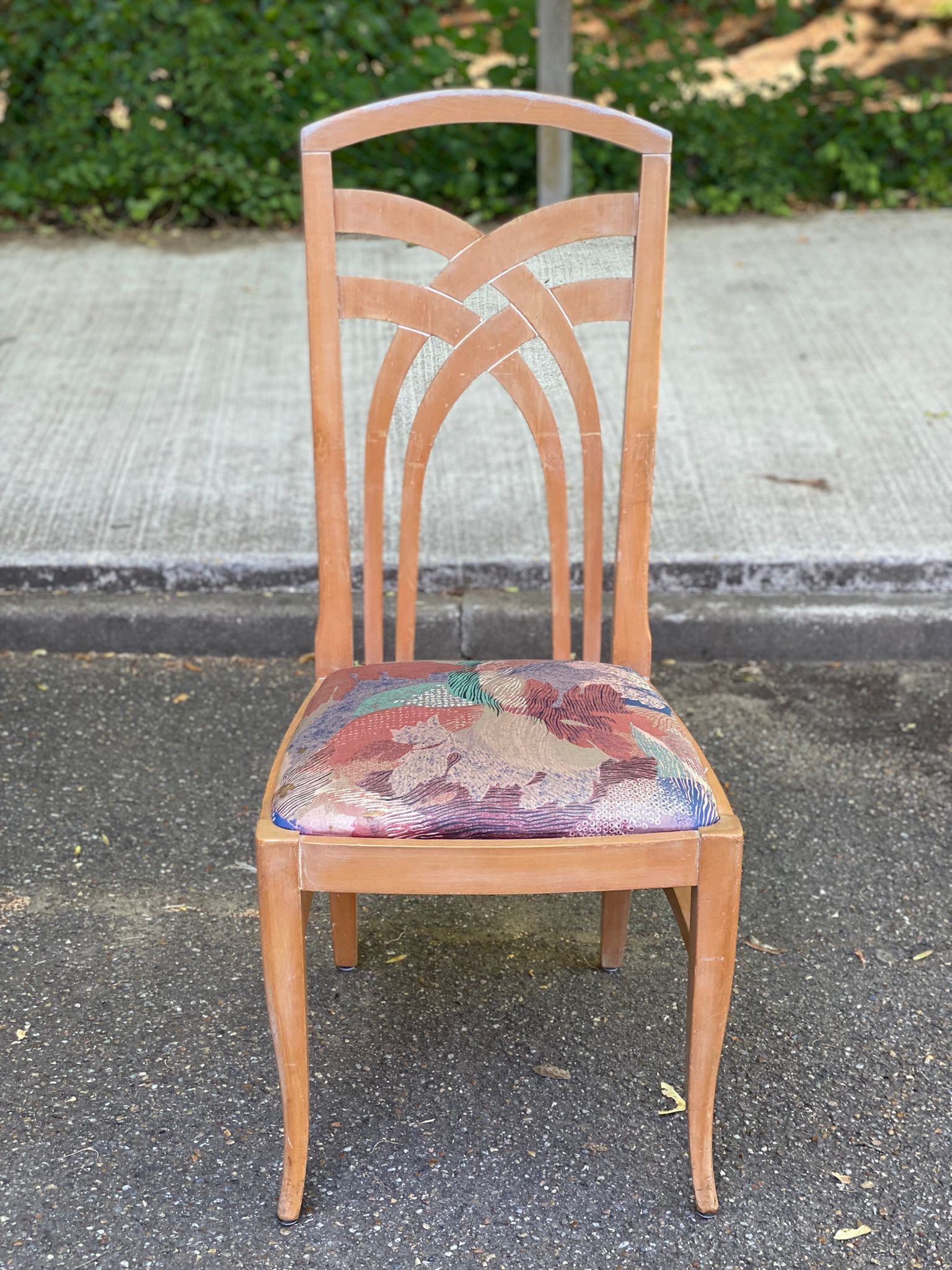 2 dining or kitchen chairs with high backs and fabric.
