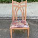2 dining or kitchen chairs with high backs and fabric.