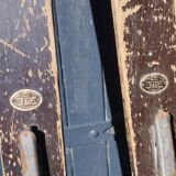 3 pairs of old skis