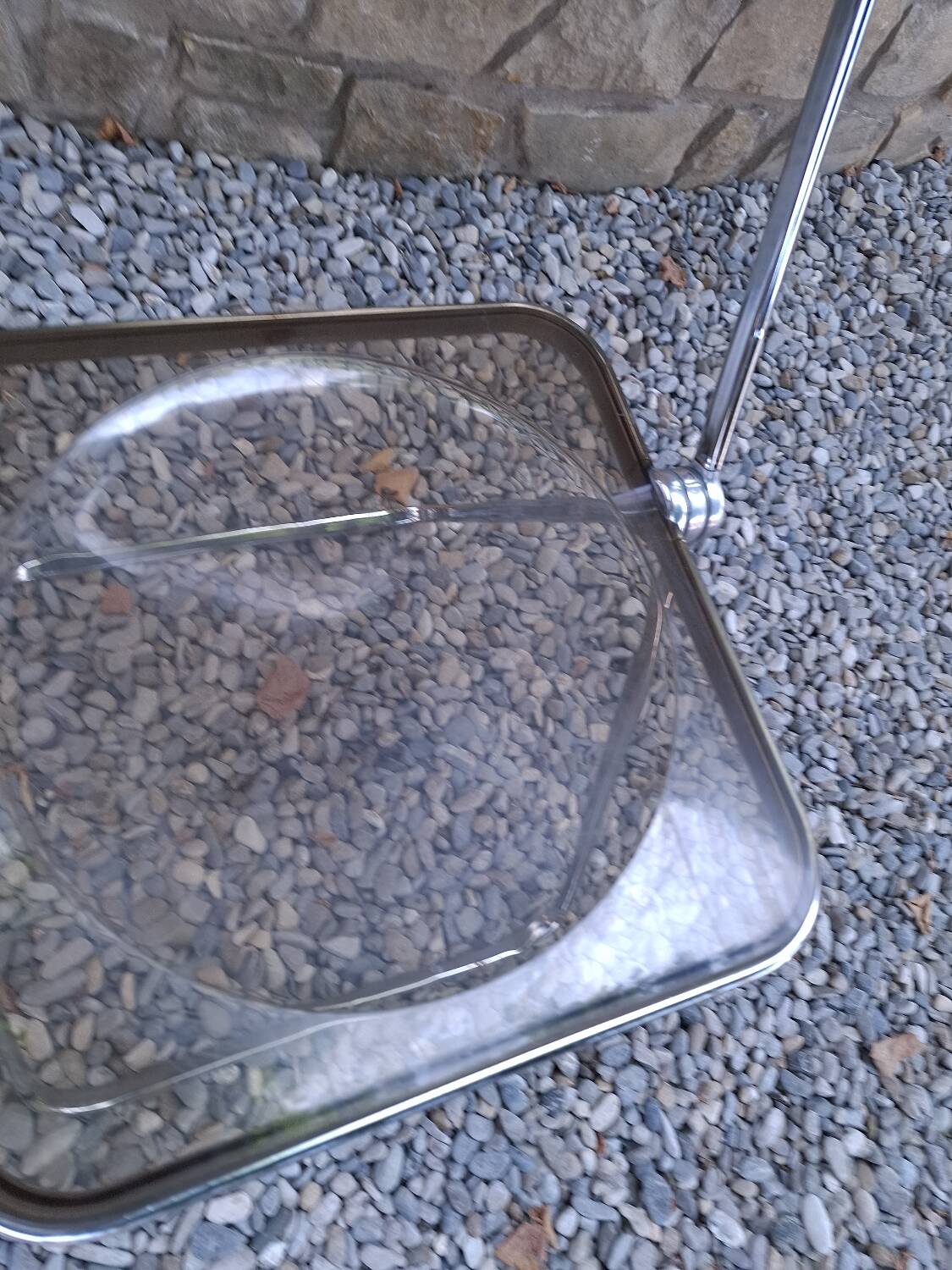 2 folding chairs designed by Giancarlo Piretti for Castelli