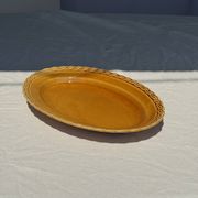 Antique oval dish, yellow-orange, frieze border L:24