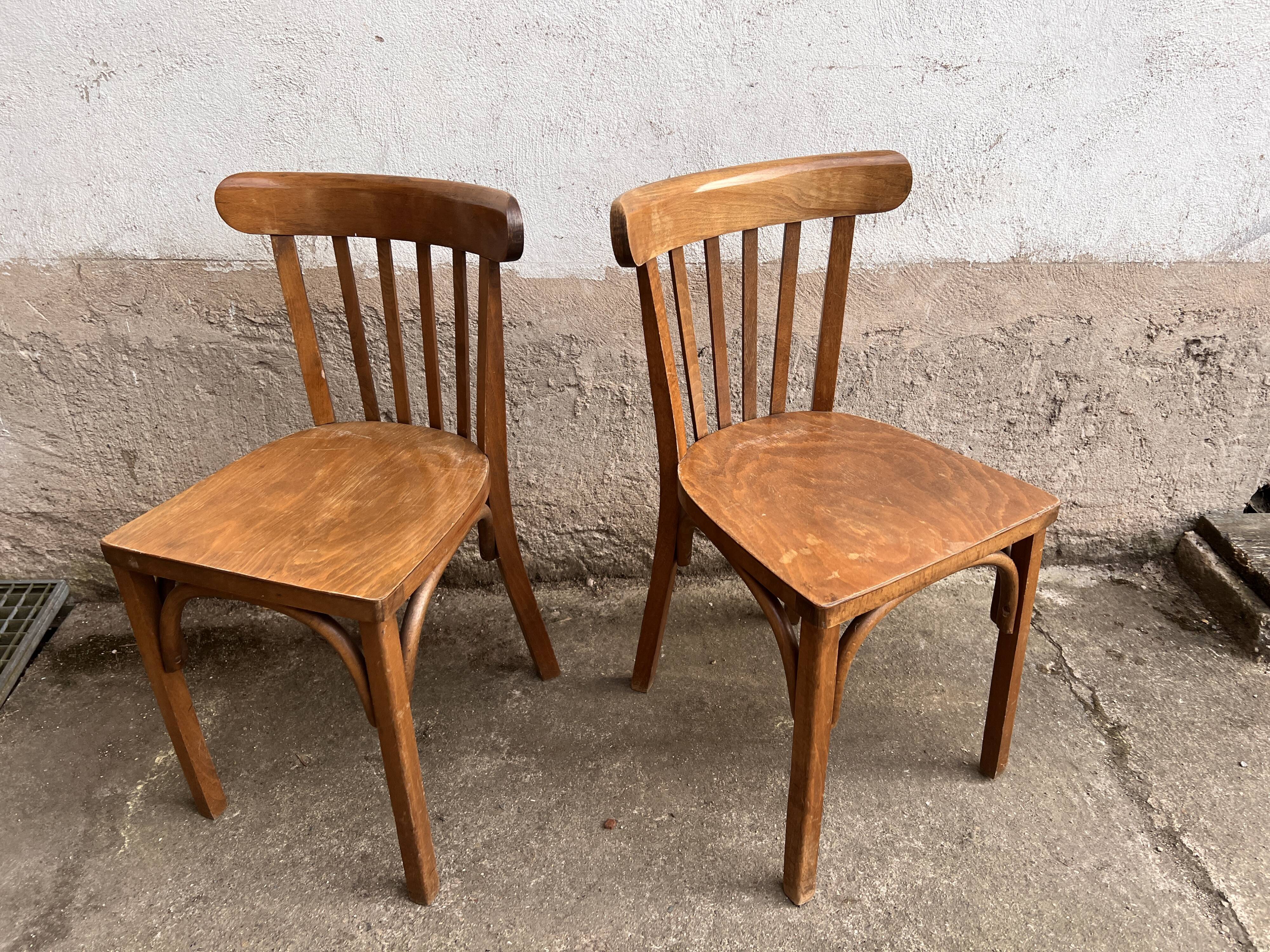 Pair of vintage wooden bistro chairs