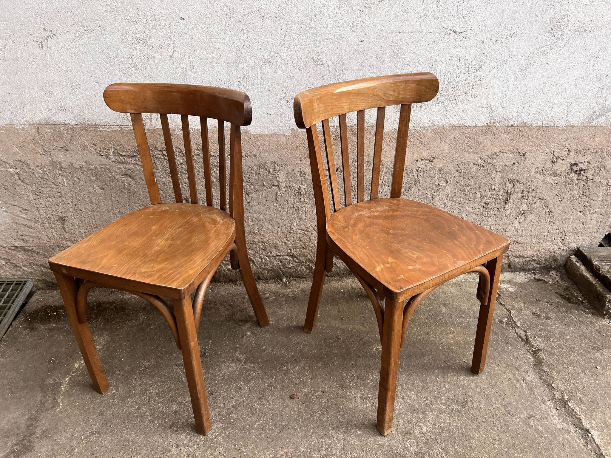 Pair of vintage wooden bistro chairs