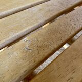 Folding chairs designed by Aldo Jacober in solid beech wood.