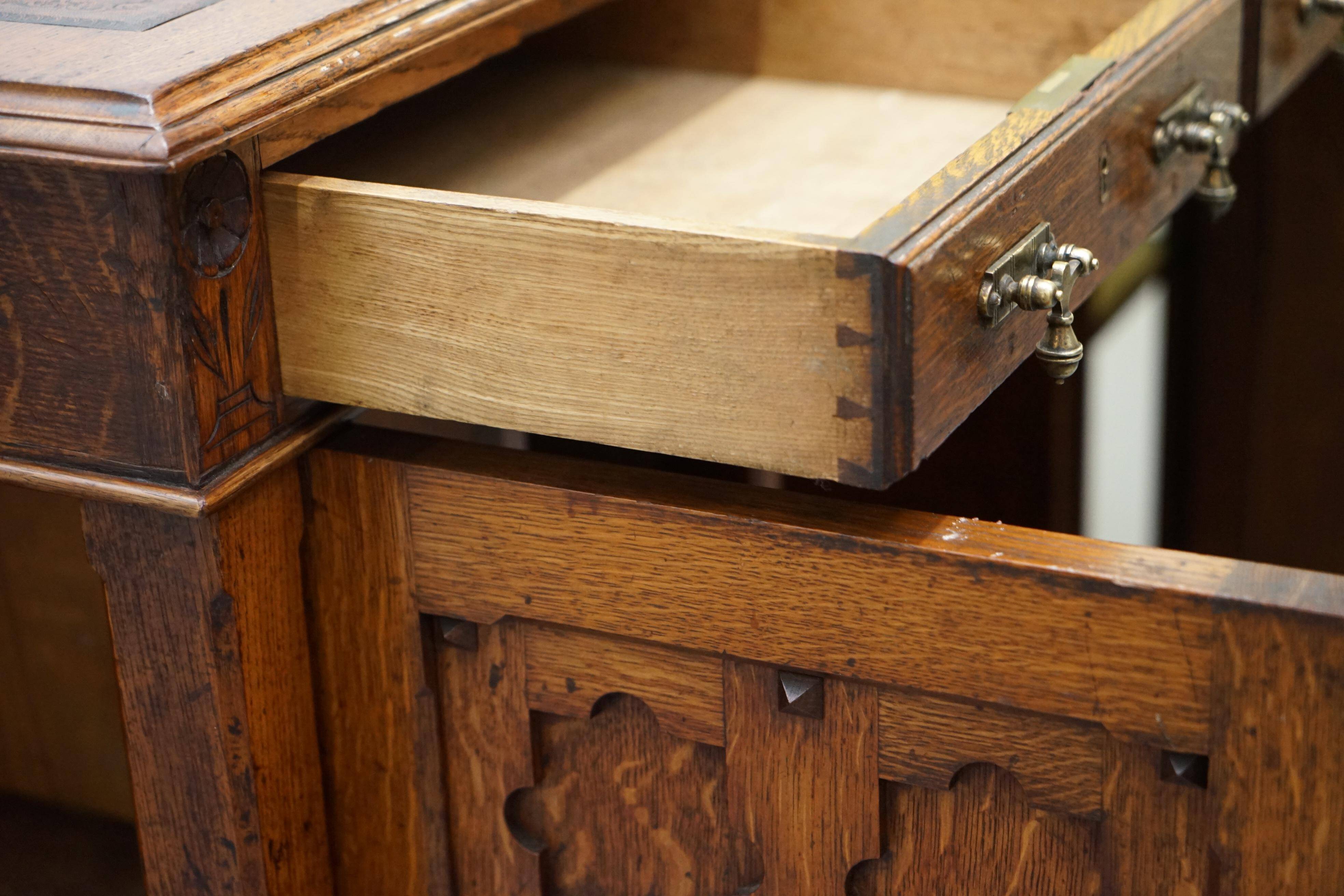 Restored Gothic desk with side bookshelves, drawer, and sloping top by Pugin Gillows.