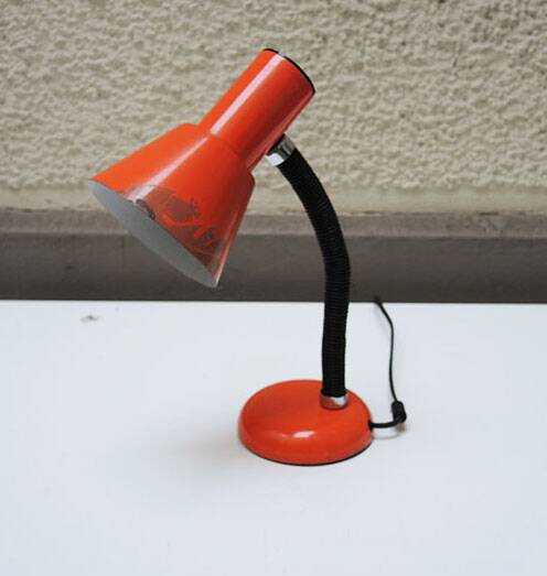 Old orange enameled sheet metal lamp