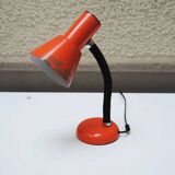 Old orange enameled sheet metal lamp