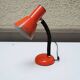 Old orange enameled sheet metal lamp