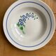 6 assiettes creuses Niderviller à décor de fleurs bleues