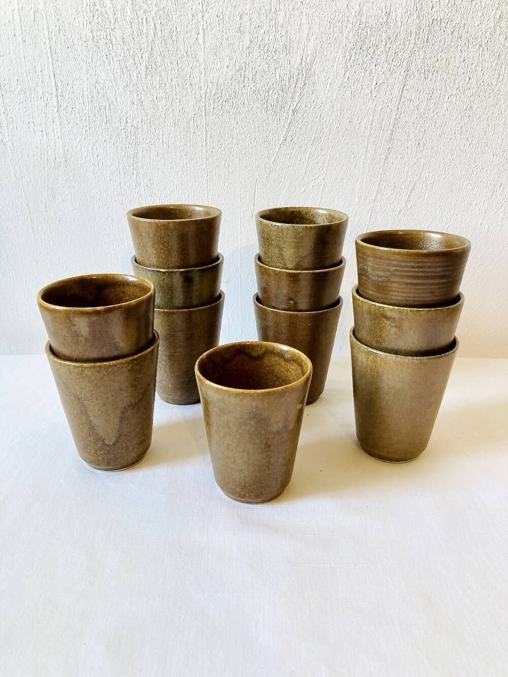 Set of 12 glazed stoneware cups, Digoin Stoneware Pots