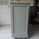 Vintage buffet on grey green wheels, 2 glass doors, wooden tray.