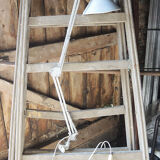 Old articulated workshop lamp in painted metal