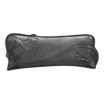 Art Nouveau pocket emptier