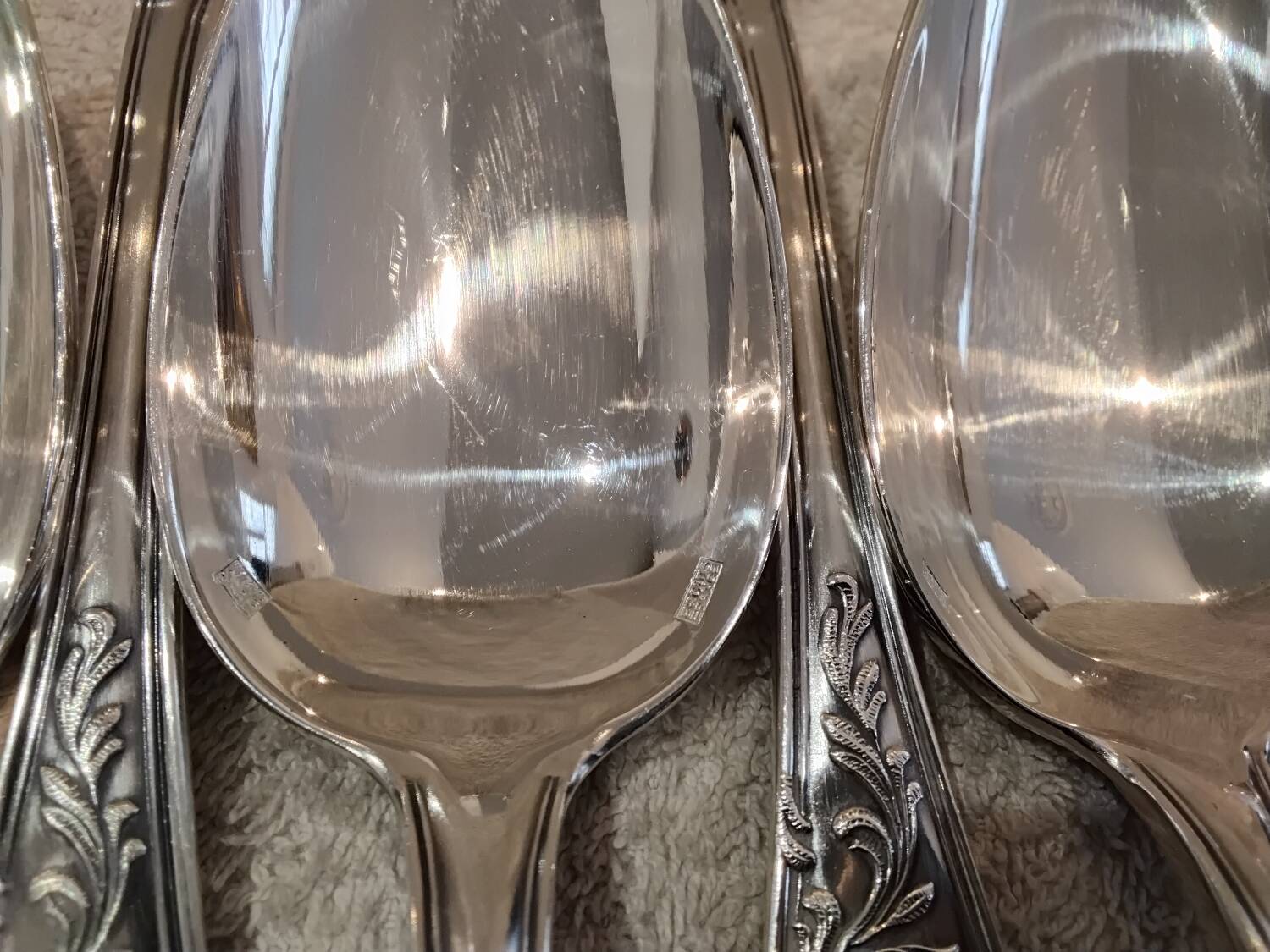 12 silver-plated metal soup spoons, Ercuis Dubarry model.