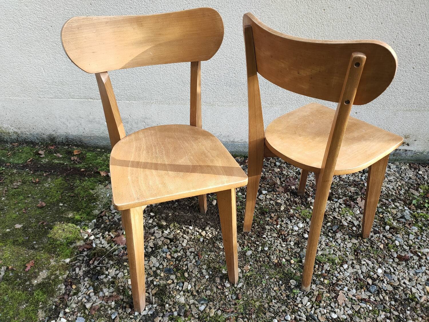 Pair of vintage solid wood bistro chairs