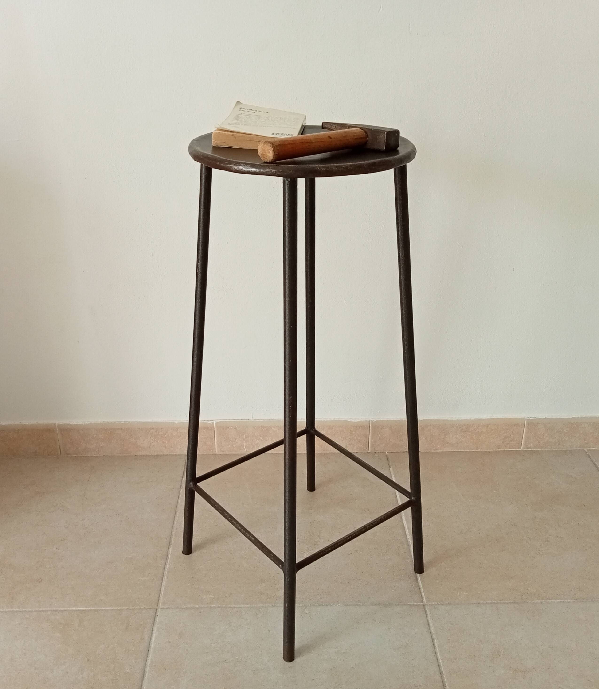 Brutalist high stool from the 1960s in solid steel.