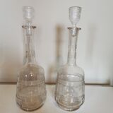 Pair of antique moulded glass decanters