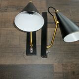 Pair of modernist sconces in black and gold metal