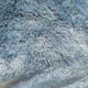 Coussin en fourrure synthétique bleu canard