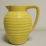 Yellow pitcher in slurry, faience onnaing frères