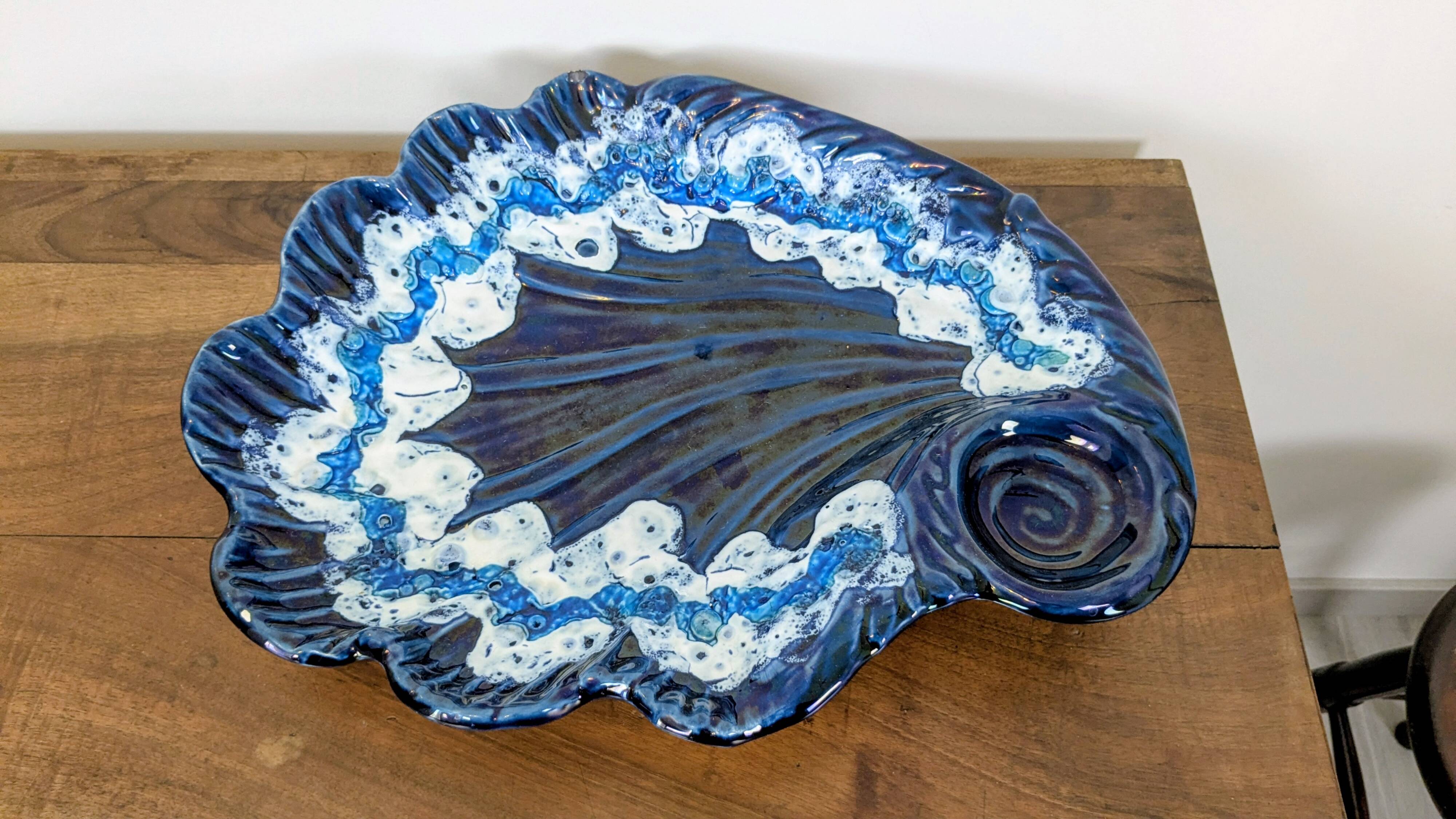Large vintage shell-shaped blue glazed ceramic bowl