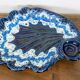 Large vintage shell-shaped blue glazed ceramic bowl