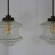 Set of two glass pendant lighting designed by Raak Holland